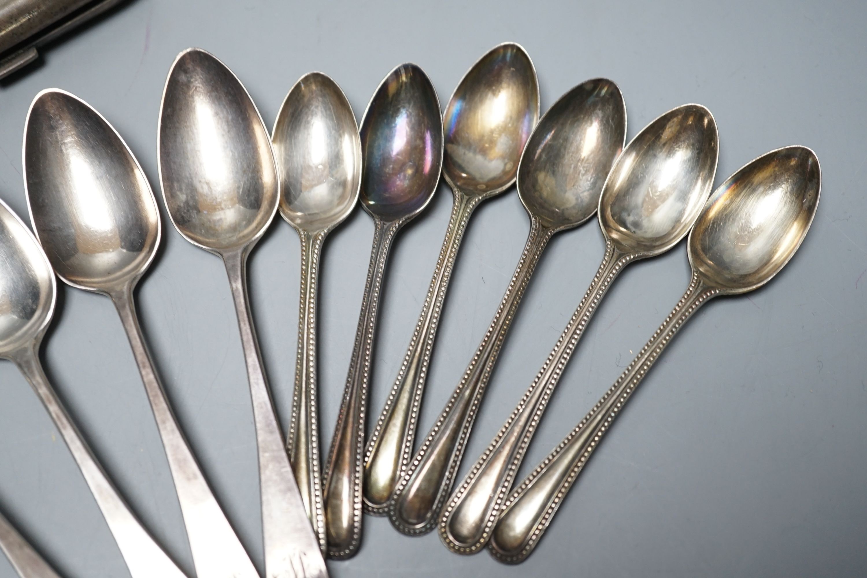 Two silver cigarette cases, a Georgian silver wine label and two sets of six silver teaspoons including London, 1801, 12.5oz.